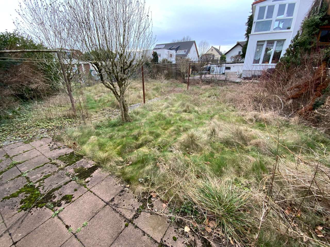 Charmantes Einfamilienhaus in guter Lage von Sandhausen, mit Garten und Garage