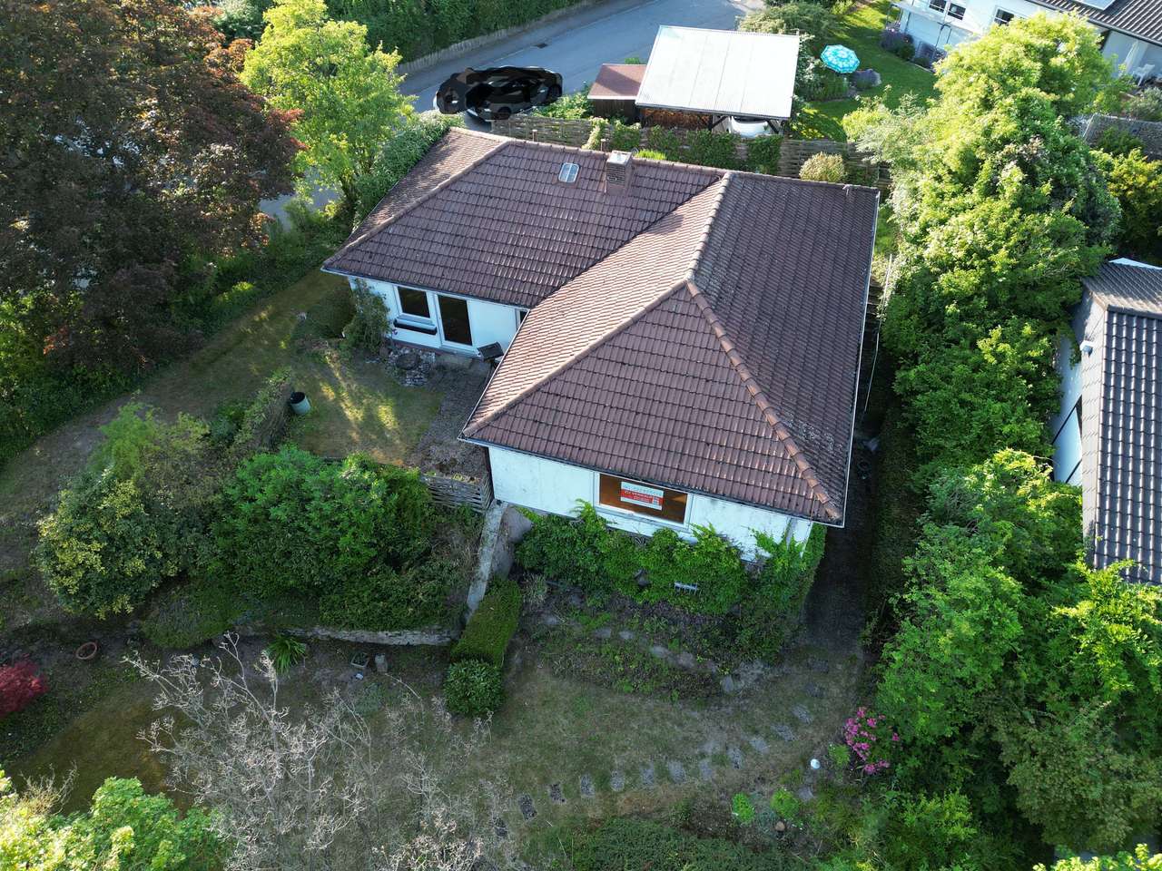 Herrlicher Bungalow mit Doppelgarage und einem sonnigen Grundstück in bester Lage von Baiertal